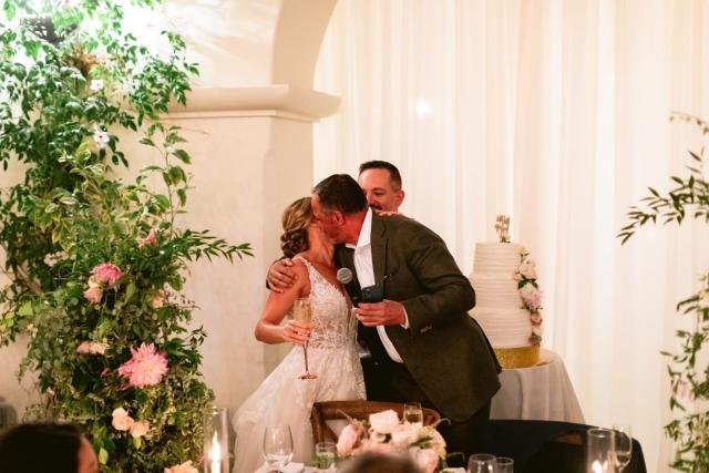 Best man kissing bride after speech for Danielle & Richard's Wedding